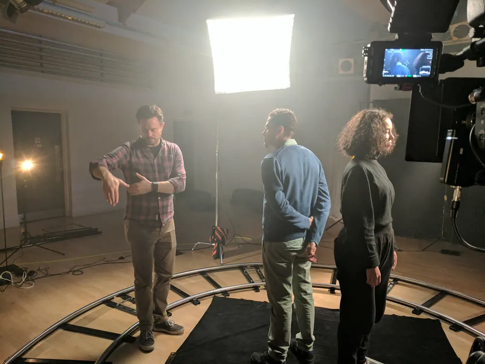 A professional film crew working together